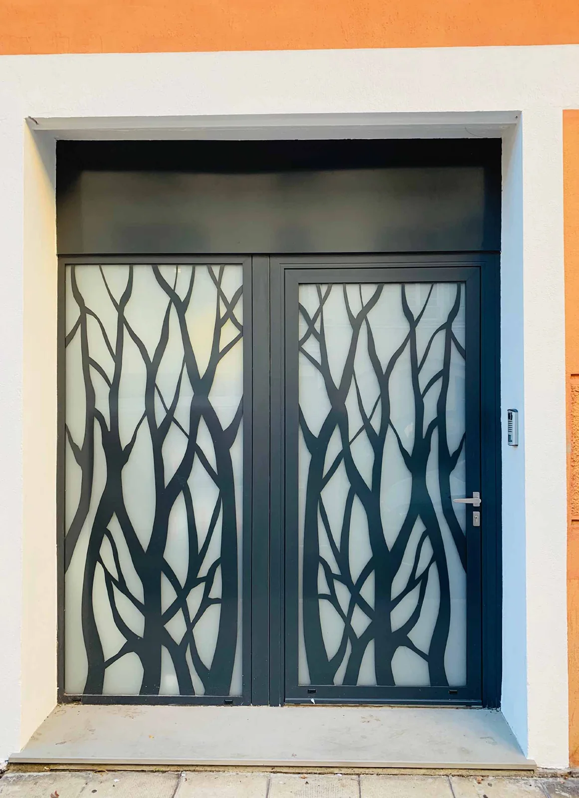 Porte avec panneau décoratif