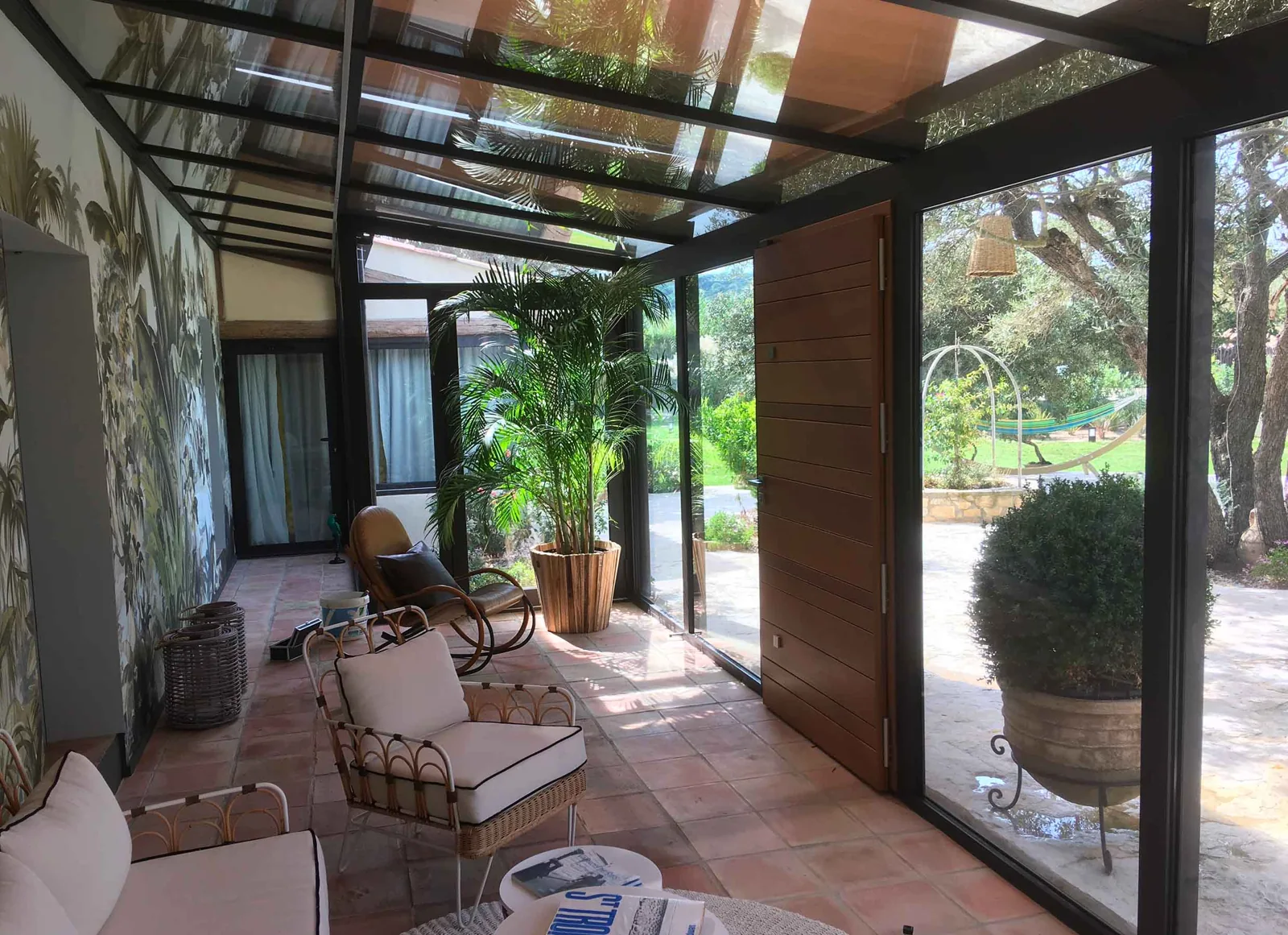Véranda ouverte sur le jardin
